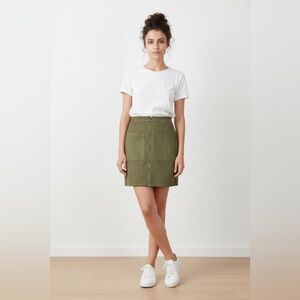 Anna Grace Suede feel skirt with great front pockets     Size: Small
